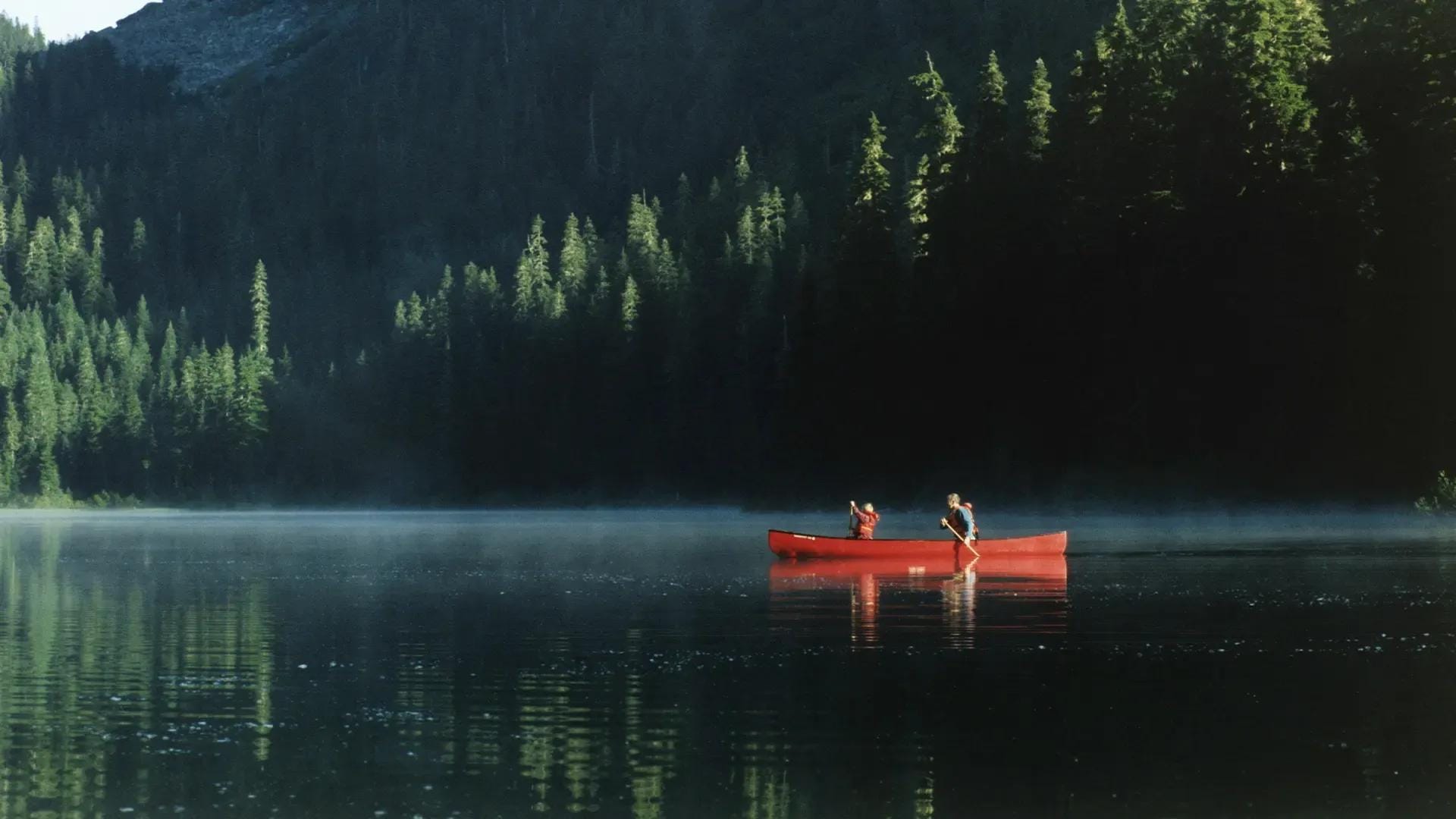 Deportistas en el lago
